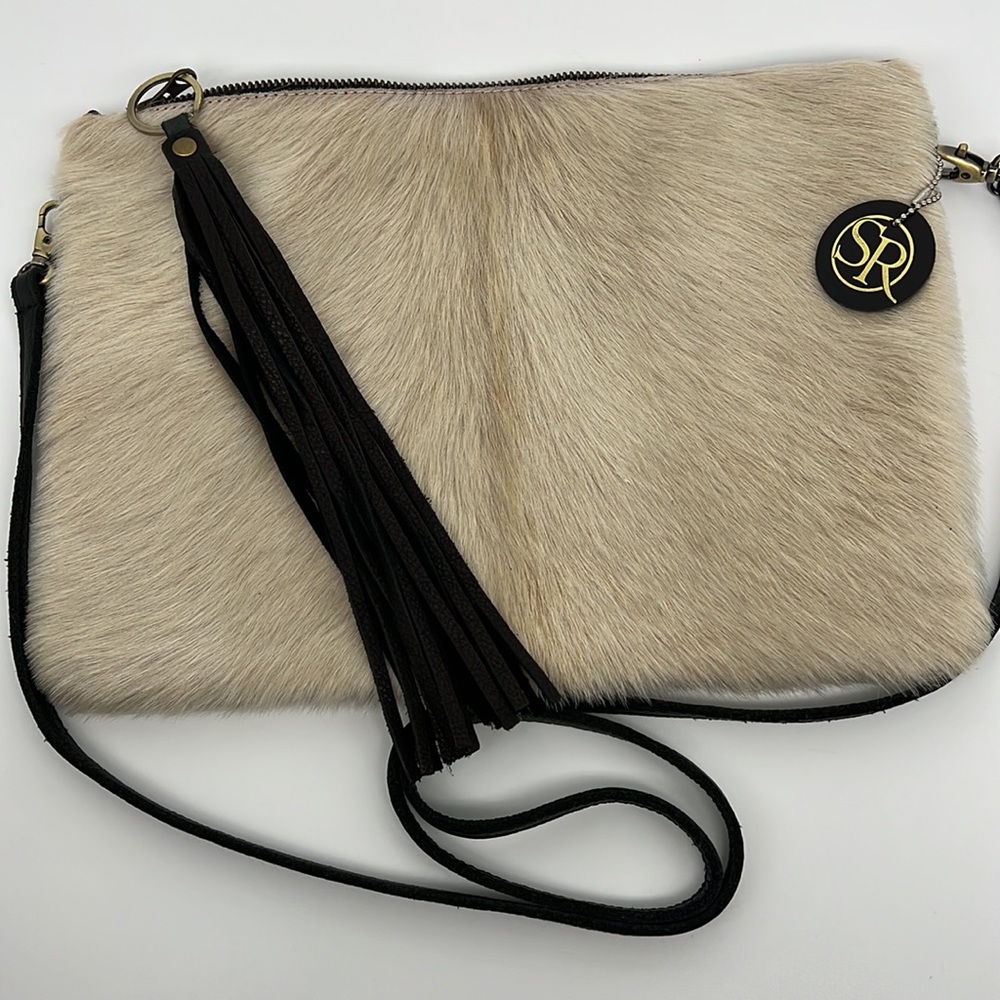 Seam Reap The "Derby" Large Clutch in natural cowhide. Like new